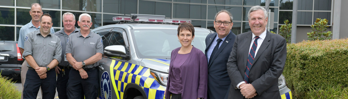 NHVR Safety and Compliance Officers, Minister Jaala Pulford, NHVR CEO Sal Petroccitto, NHVR Chair Duncan Gay out the front of the NHVR's Victorian headquarters in Port Melbourne.